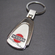 Авто брелок Nissan | Ніссан | на ключі, овальної форми як оригінальний подарунок
